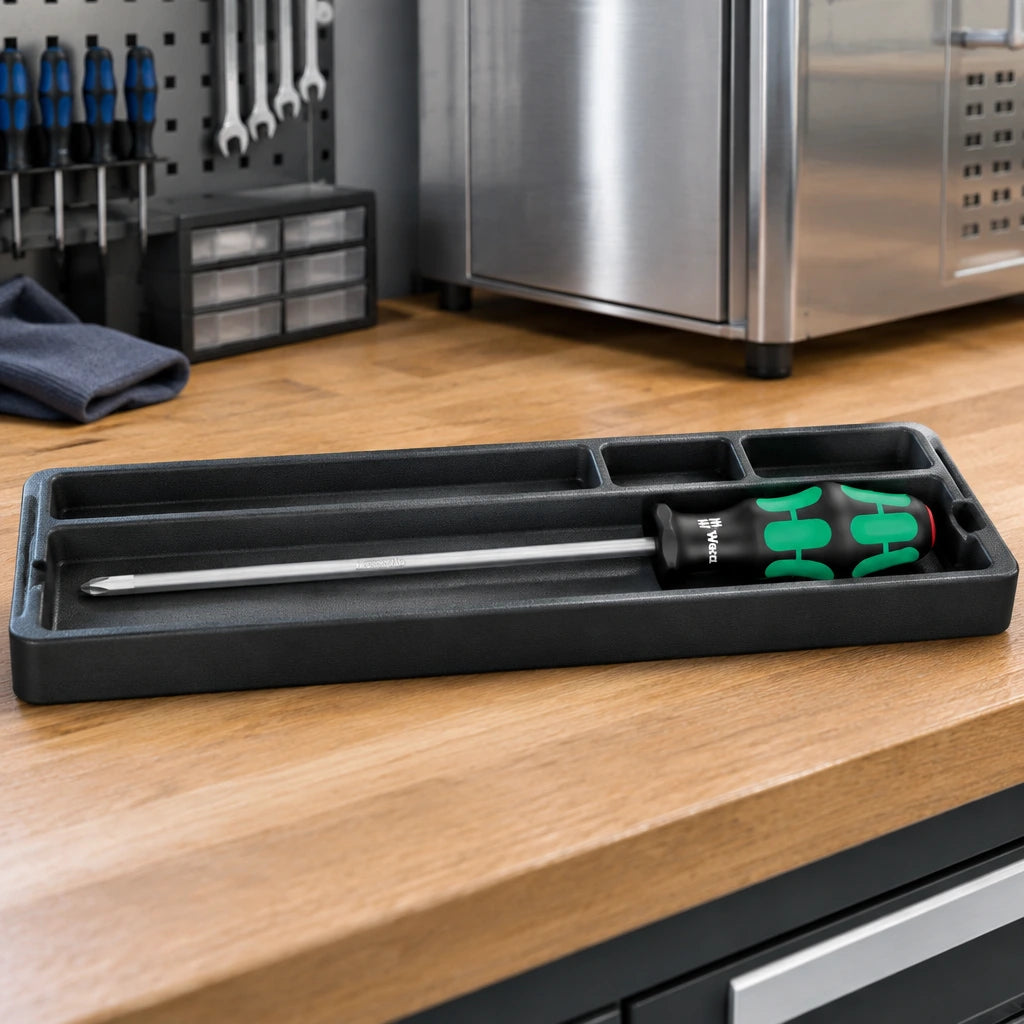 Wera PH2 extended-blade screwdriver resting in a tool tray at a clean appliance repair workstation