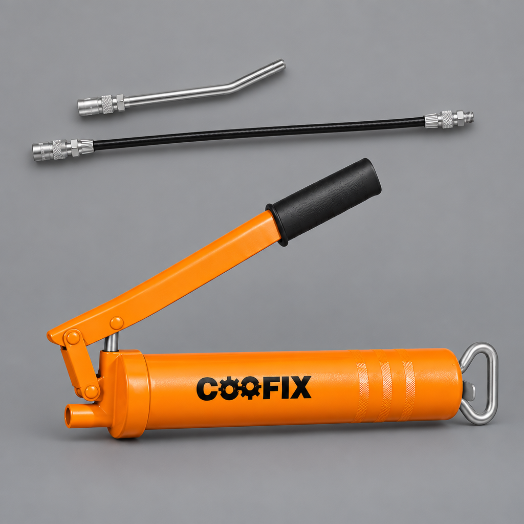 Coofix grease gun and supplied nozzles on grey