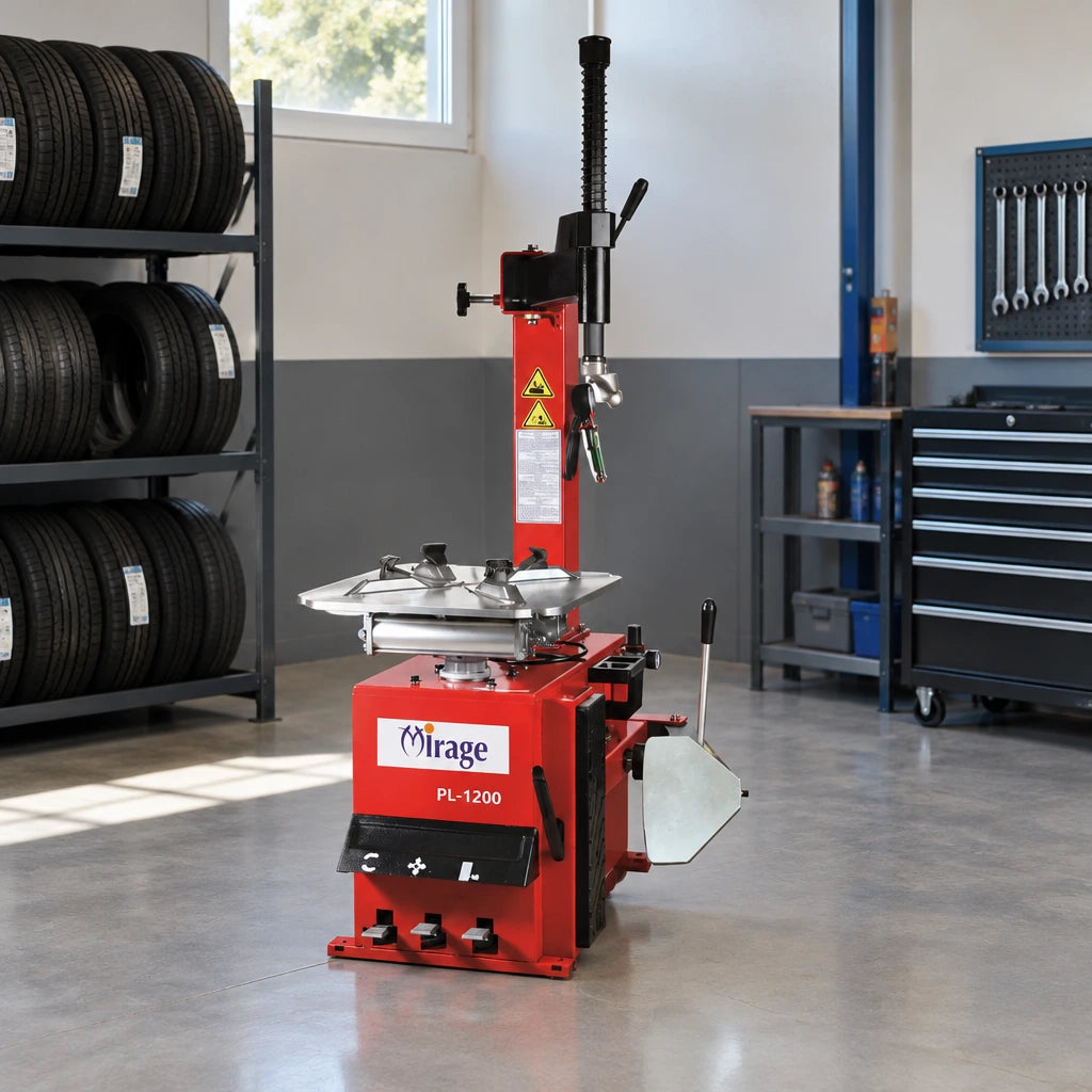 Mirage semi-automatic tyre changer parked at an organised professional tyre-service station before use.