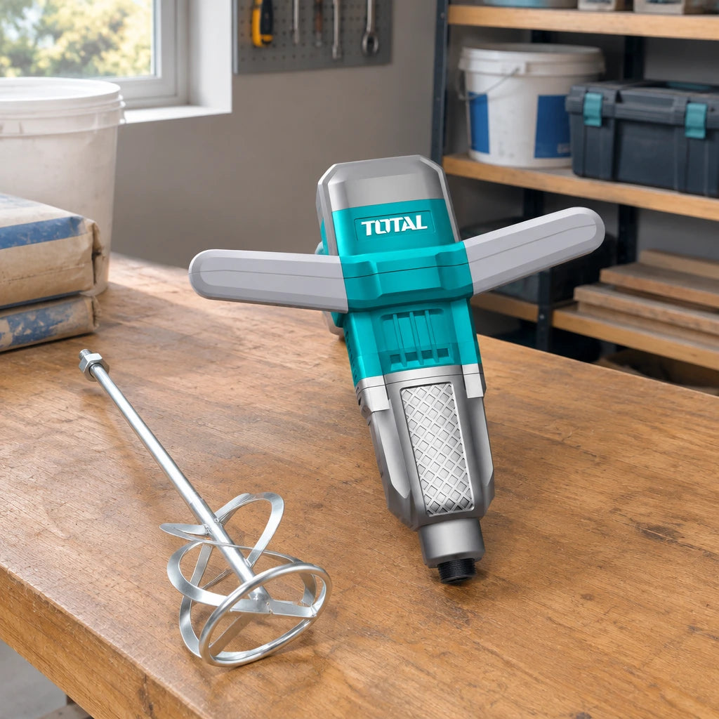Total TD716008 electric mixer resting beside its mixing paddle at an organised renovation materials station