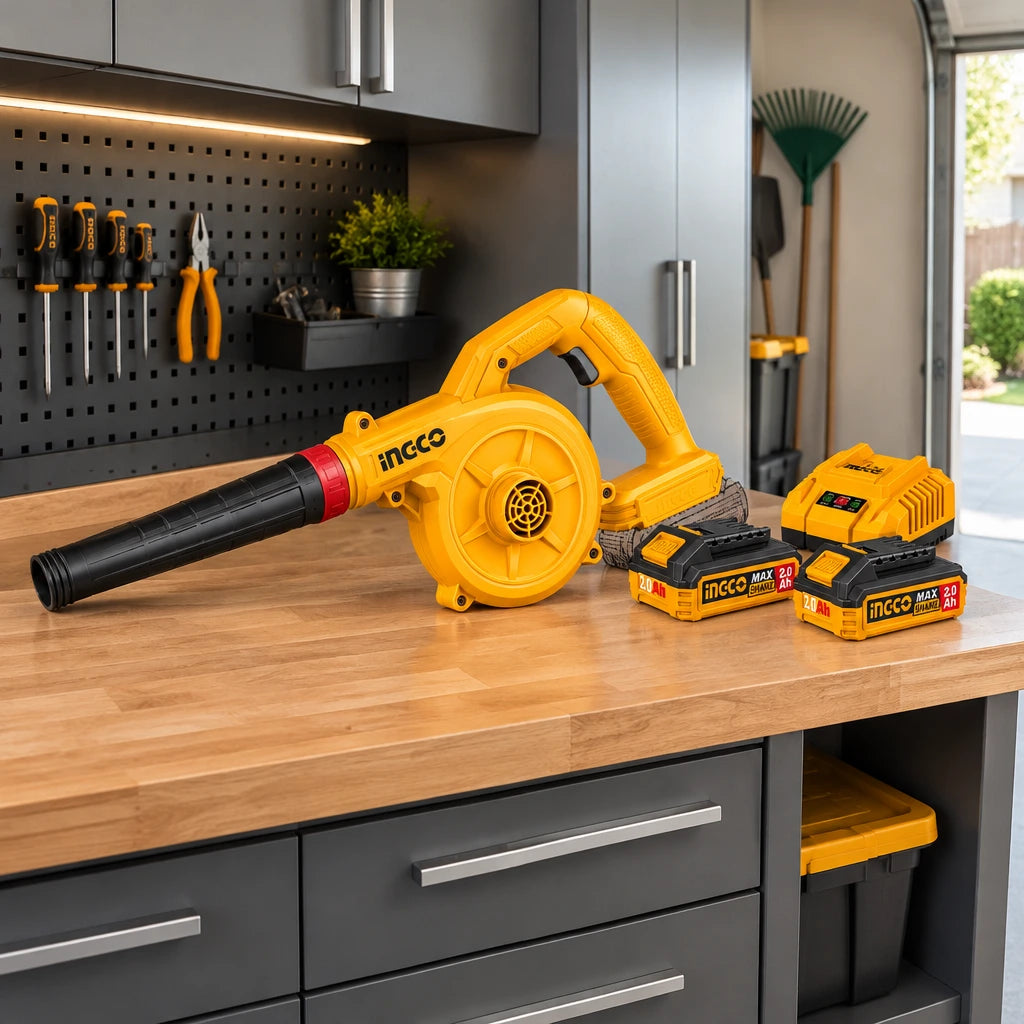 Ingco cordless air blower kit stored on an organised workbench in a contemporary residential garage.