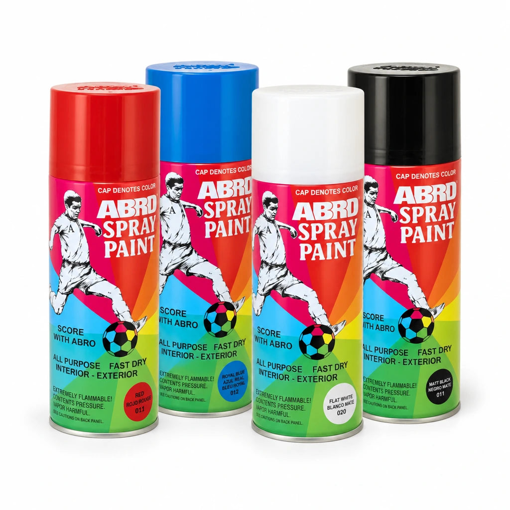 Four Abro multipurpose colour spray paint aerosol cans in red, blue, white and black arranged on a white background