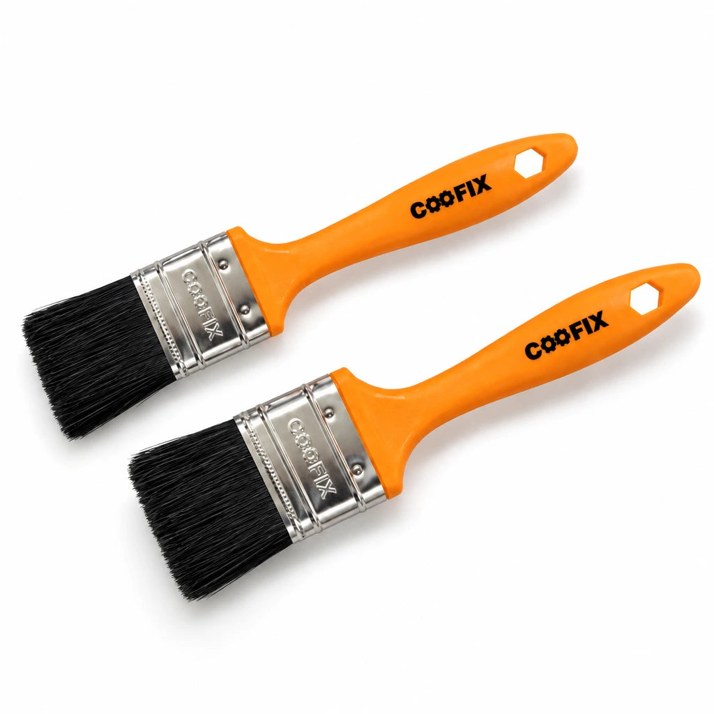 Two Coofix orange-handled black-bristle paint brushes with silver ferrules on a white background