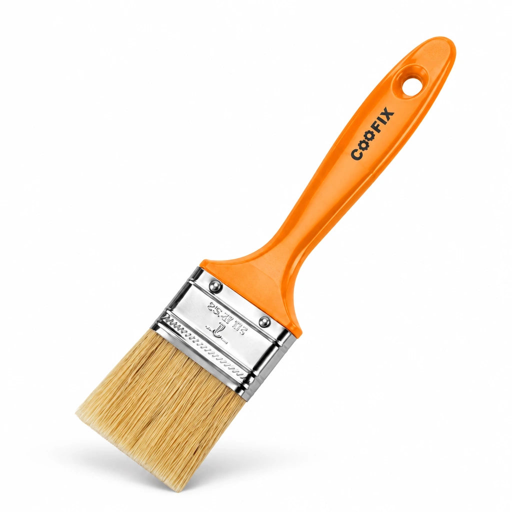 Coofix flat paint brush with orange plastic handle, metal ferrule and fibre bristles on a white background.