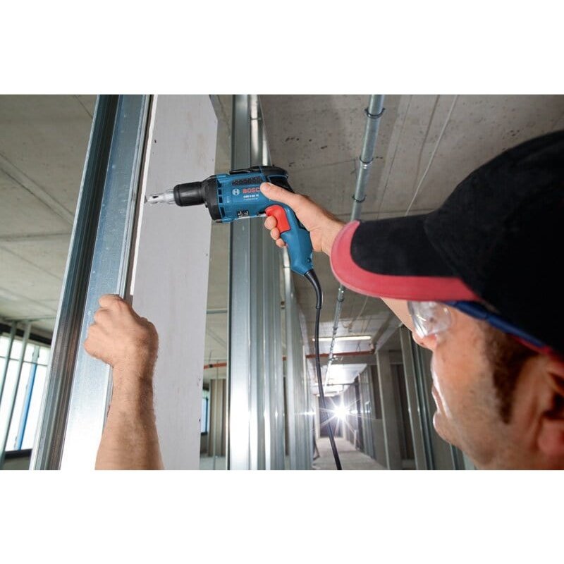 Efficiently fasten drywall with the Bosch Drywall Screwdriver 700W (GSR 6-45 TE) at SupplyMaster.store in Ghana. Powered Screwdriver Buy Tools hardware Building materials