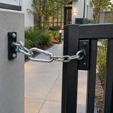 Completed service gate with Atlas galvanised screw-lock snap hook securing a chain restraint