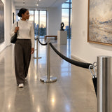 Completed temporary gallery barrier with Atlas galvanised snap hook securing the rope connection