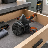 Climax CLI-745-A respirator stored in an organised PPE drawer in a contemporary home utility room.