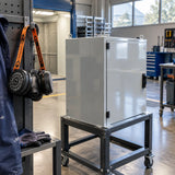Finished coated metal enclosure ready for inspection with a Climax CLI-755-A respirator nearby