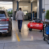 Ready vehicle outside an organised workshop with the GGA 270L air compressor visible after tyre service