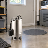 LuckyPro stainless steel submersible sewage pump stored beside a covered sump in a clean utility room