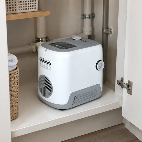 LuckyPro IVP water pump resting in a clean apartment utility cupboard beside household plumbing.