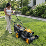 African American homeowner guiding a Marsant self-propelled lawn mower across a gently sloping residential lawn