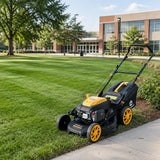 Even institutional lawn ready for use with a Marsant self-propelled mower parked at the freshly cut edge