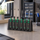 Wera security TORX precision screwdriver set resting in its rack on an organised electronics service workstation