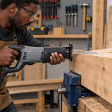 Black carpenter using the Coofix wood-cutting blade