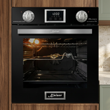Black Kaiser Grand Chef oven built into walnut cabinetry