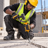 Black professional mason using the Coofix flat cold chisel