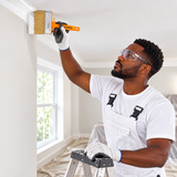 Black professional painter using the Coofix ceiling brush