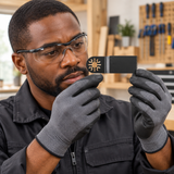 Black professional technician inspecting the wide oscillating blade