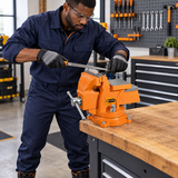 Black professional technician using the orange Coofix bench vise
