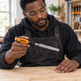 Carpenter inspecting the Coofix wood chisel