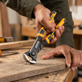 Carpenter lifting a small tack from wood with the Ingco rabbet pliers