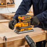 Carpenter sanding a clamped timber board with the Ingco finishing sander