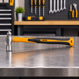 Coofix ball-peen hammer on a workshop table