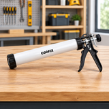 Coofix caulking gun on a workshop table