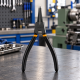 Coofix circlip pliers on a workbench