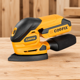 Coofix cordless sander on a workbench