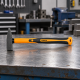 Coofix machinist hammer on a workbench