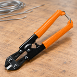 Coofix mini bolt cutter on a workshop table