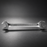 Coofix spanner on a cinematic grey background