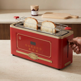 Corrected face-hidden scene operating the red Kaiser toaster
