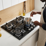 Face-hidden cooking scene with the Kaiser four-burner hob