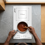 Face-hidden sauce preparation on the white Kaiser ceramic hob