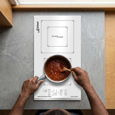 Face-hidden sauce preparation on the white Kaiser ceramic hob
