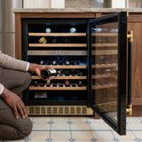 Face-hidden scene retrieving a bottle from the open Kaiser wine cooler