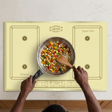Face-hidden vegetable preparation on the ivory Kaiser Empire induction hob