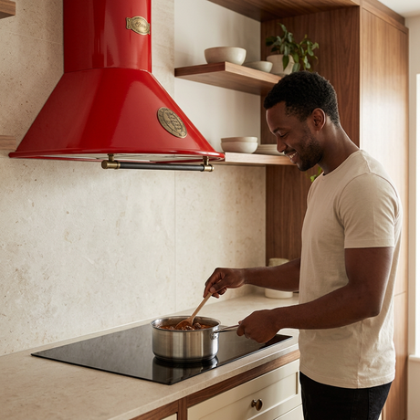 Home cook beneath the red Belle Epoque hood