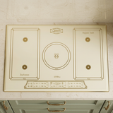 Ivory Kaiser Empire induction hob installed in a sage kitchen