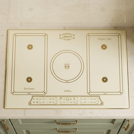 Ivory Kaiser Empire induction hob installed in a sage kitchen
