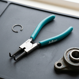 JcTop curved-tip circlip pliers on a workshop repair mat