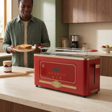 Man serving toast beside the red Kaiser toaster