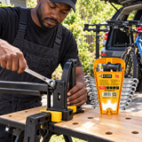 Mechanic using a spanner from the 8-piece set outdoors