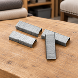 Metal staple strips on a workbench
