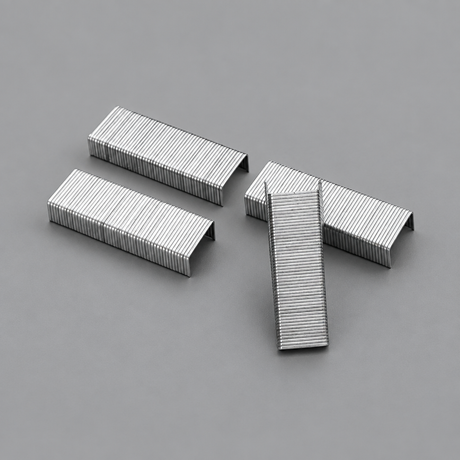 Metal staple strips on grey
