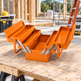Open orange cantilever toolbox on a worktable